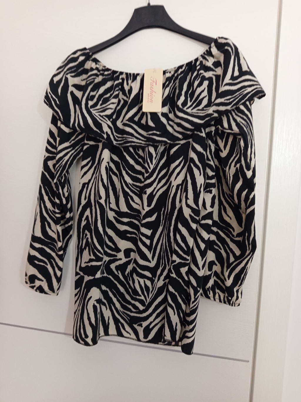Blusa scollo a barca